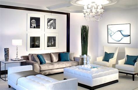 Adding accent pillows of blue and yellow added a sunny feeling to this space. Black and White Living Room Design and Ideas - InspirationSeek.com