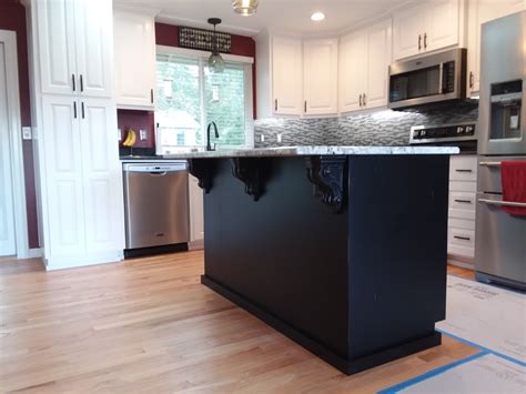 Dark cabinets don't have to be black—if the midnight mood isn't for you, consider a lighter shade of brown. Creative Custom Cabinets | White Kitchen Cabinets With ...