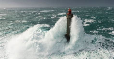 Dramatic Photos As Massive Waves Completely Engulf Lighthouse In Huge