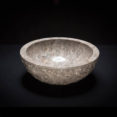Boasting a chiseled front, this premium product brings a unique look to your space. Marble Beige Textured Stone Vessel Sink - Decora Loft