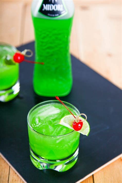 Strain into a martini glass, garnish with an olive or lemon peel and serve. how to make a midori sour | Midori sour, Midori drinks ...