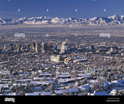 Salt Lake City Utah Usa Winter Snow Covers Cityscape And Front Range