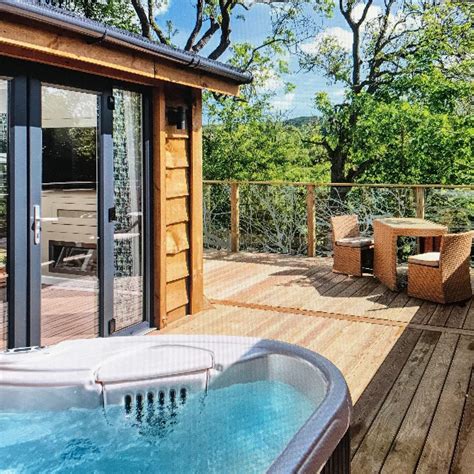 treehouse with hot tub luxury lodge lodges tree house