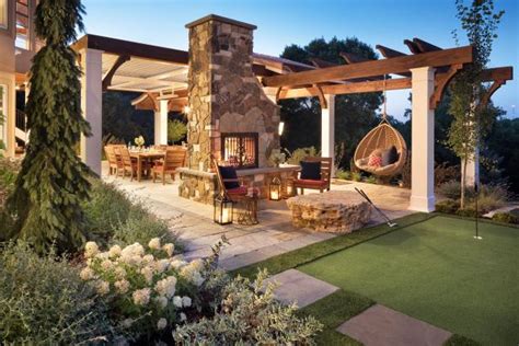 Elevated Backyard With With Pergolas And Putting Green Hgtvs
