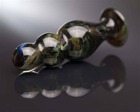glass trainer plug alien marble