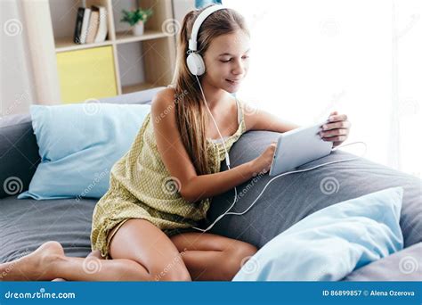 Tween Girl Relaxing On Couch At Home Stock Image Image Of Human