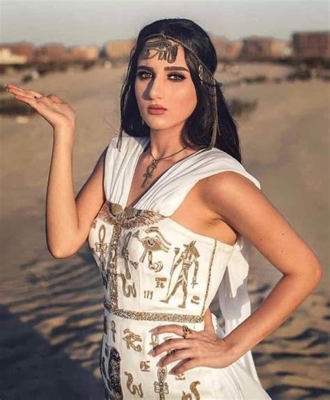 Egyptian Woman Wearing A Dress And Accessories Inspired By The Clothes