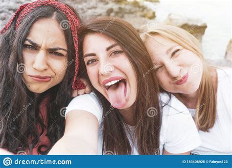 Group Of Happy Multiracial Friends Having Fun Taking A Funny Selfie