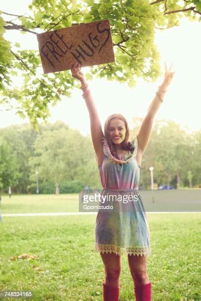 Woman Holding Up Peace Sign Photos And Premium High Res Pictures Getty Images