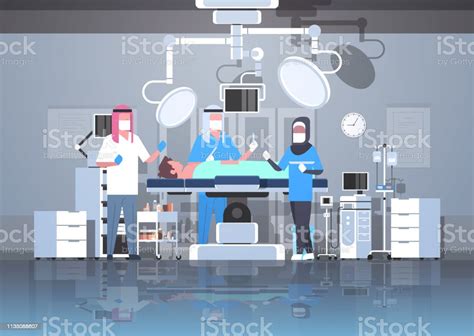 Arabic Surgeons Team Surrounding Arab Patient Lying On Operation Table