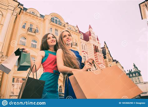 Shopping And Tourism Concept Beautiful Girls With Shopping Bags In
