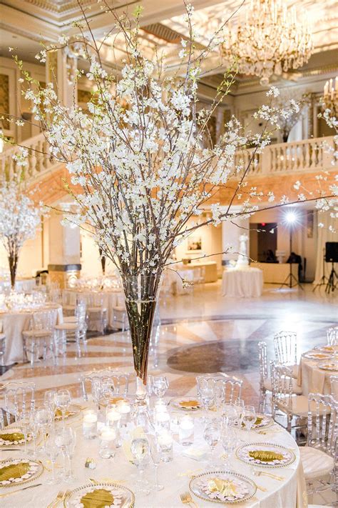 Giant Cherry Blossom Centerpieces Hint At This Couples Wedding Theme