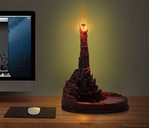 It is an exact model of the fortress of sauron. Lampe oeil de Sauron - Geek, Idee deco, Lampe Geek