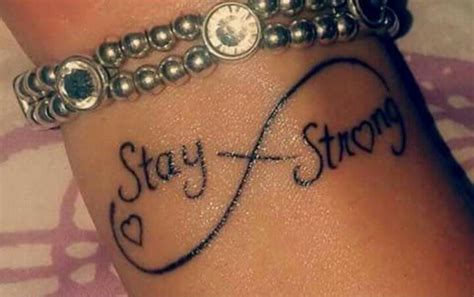 Little Wrist Tattoo Of The Infinity Symbol Saying “stay Strong” With A