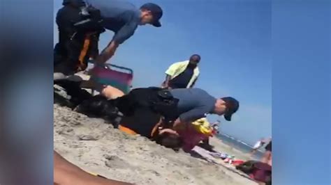 Police Investigating Video Depicting Officer Punching Woman During Arrest At Beach Abc11