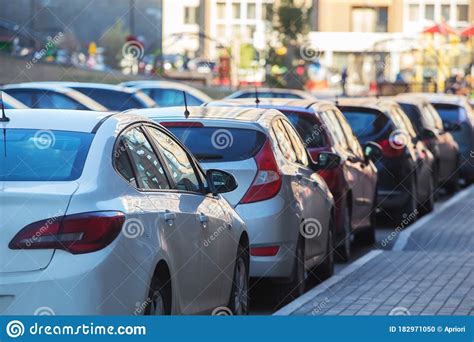 Cars Parked In The Courtyard Of A Residential Building Stock Photo