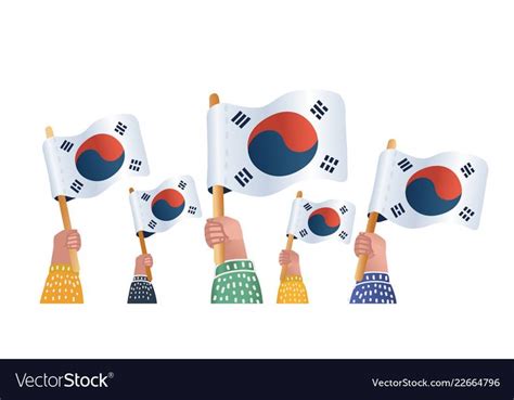 Hand Holding Flags With The Flag Of South Korea In Different Colors And