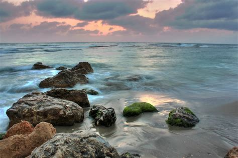Rock Formation On Sea Shore During Sunset Caesarea Israel Hd