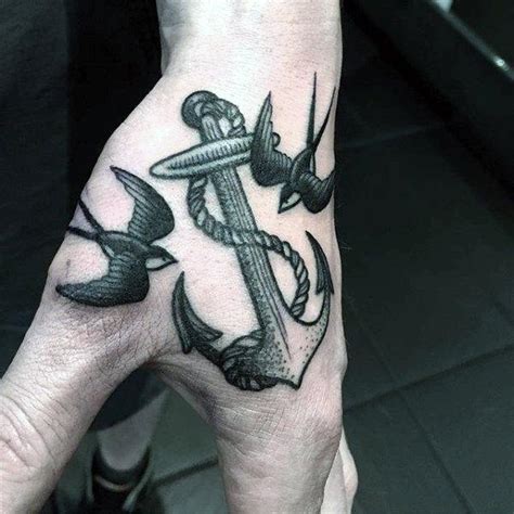 Tribal trident tattoo on hand for men. 60 Small Hand Tattoos For Men - Masculine Ink Design Ideas