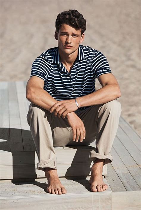 Barefoot Man On Beach Wearing Khaki Pants Striped Polo Shirt Polo