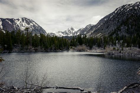 Body Of Water Surrounded With Mountains · Free Stock Photo