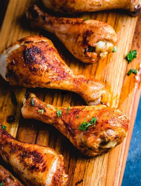 you need to try this super easy baked chicken legs recipe cajun seasoning is rubbed on the drum