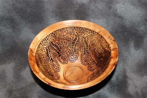 I See Horses Carved In A Solid Koa Bowl Only At