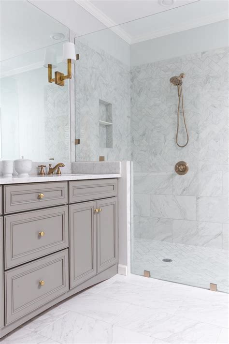 Textured marble might also be a great option. 18 Gorgeous Marble Bathrooms with Brass & Gold Fixtures