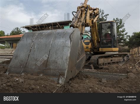 Excavator Parked Site Image And Photo Free Trial Bigstock