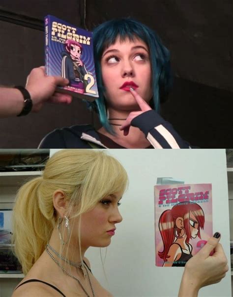 A Woman With Blue Hair Holding Up A Comic Book To Her Face And Looking