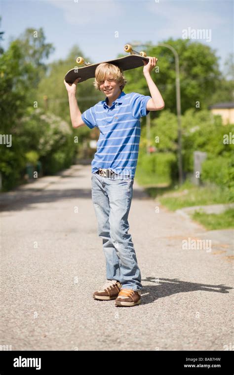 Portrait Of A Boy With A Skateboard Sweden Stock Photo Alamy