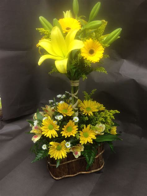 Topiary arrangement with yellow mixed flowers. in Bristol, PA | Bristol Florists
