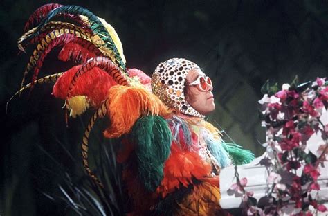 Elton john performs at dodger stadium in los angeles, 1975. Elton John is back in fashion