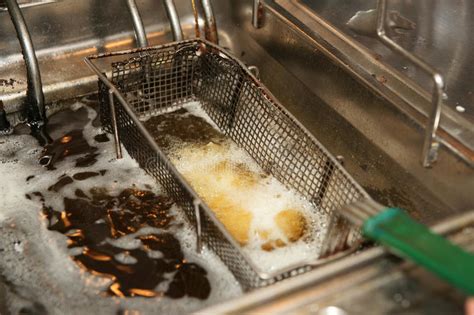 Deep Fryer With Boiling Oil In A Restaurant Stock Image Image Of Food Full 35997211