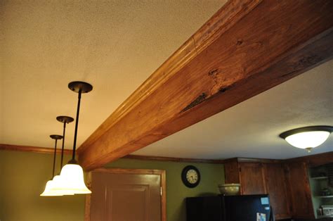 Crown molding is often viewed as one of those magical fixes that you can use to accessorize your home with very little work. Pine-wrapped LVL Beam w/ Pine Crown Molding | Steve Erwin ...