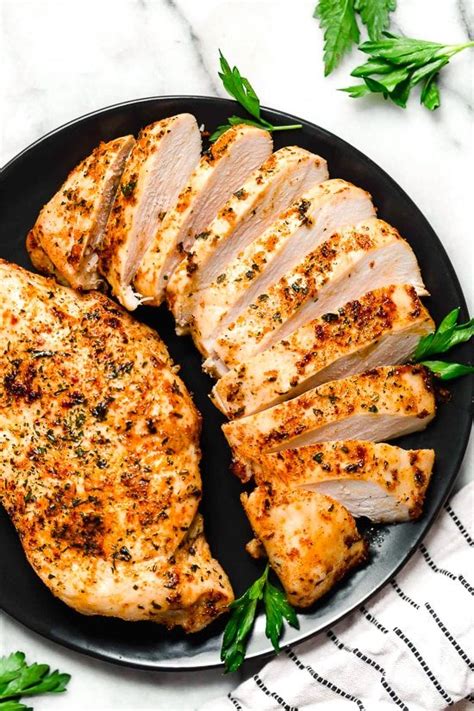 Cook for 4 minutes, flip spray with olive oil spray and cook for another 4 minutes. HOW TO MAKE JUICY AIR FRYER CHICKEN BREASTS