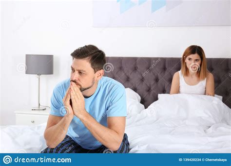 Couple With Relationship Problems Ignoring Each Other Stock Photo