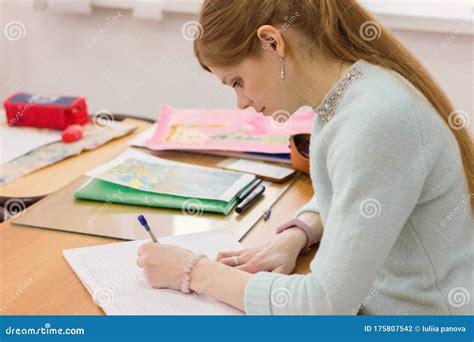 Young Beautiful Woman Writing With Left Hand Stock Photo Image Of