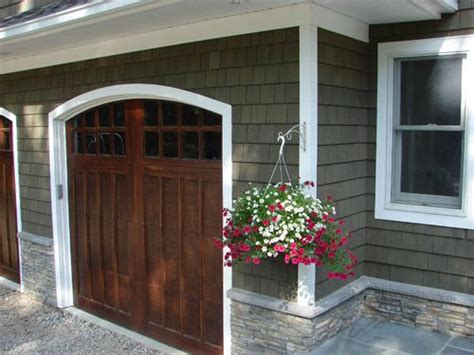95 likes · 1 talking about this. green stained cedar shingles. wood garage door. Tristan ...