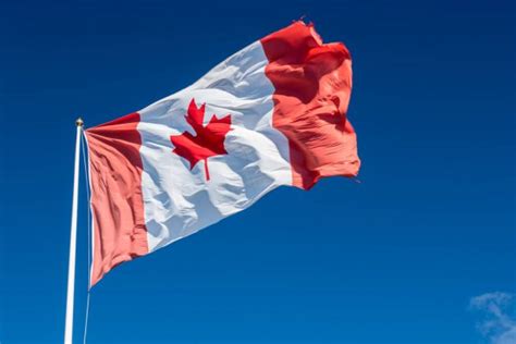 Canada Flag And Mountains Stock Photo By ©surangastock 32863515