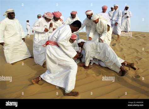 Group Of Arab Men In The Desert Stock Photo Alamy