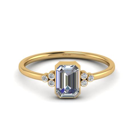Petite Bezel Set Emerald Cut Diamond Engagement Ring In 14k Yellow Gold