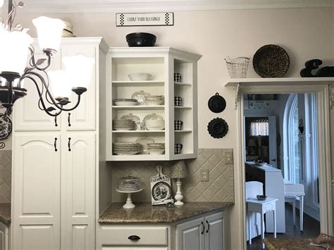 Price and stock could change after publish date, and we may make money from these links. Creamy soft white painted cabinets in my Texas kitchen. I took off the cabinet door to this ...