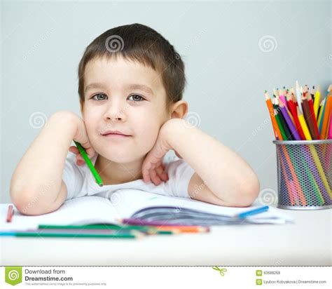 Little Boy Is Holding Color Pencils Stock Photo Image Of Closeup