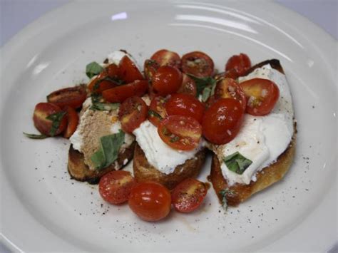 Ideal for a summer gathering with friends, this easy dish is fresh, tasty and full of flavour. Bruschetta Recipe | Robert Irvine | Food Network