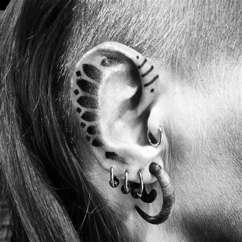 It's sweet and actually puts a smile on our faces. Small Ear Tattoo Ideas: Helix Tattoos