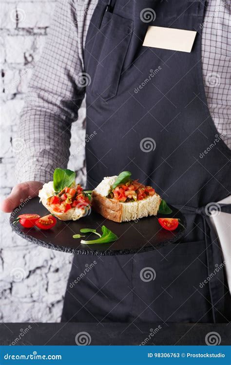 Waiter Offering Delicious Restaurant Dish Stock Image Image Of Staff