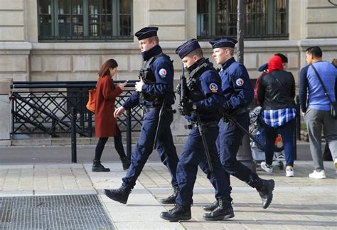 Officers Control The Perimeter Outside The Paris Police Headquarters