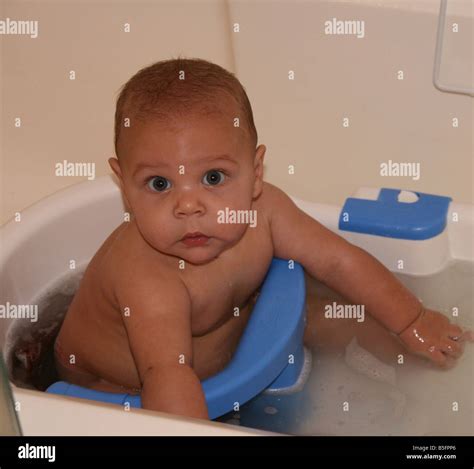 Baby Boy In Bath Stock Photo Alamy