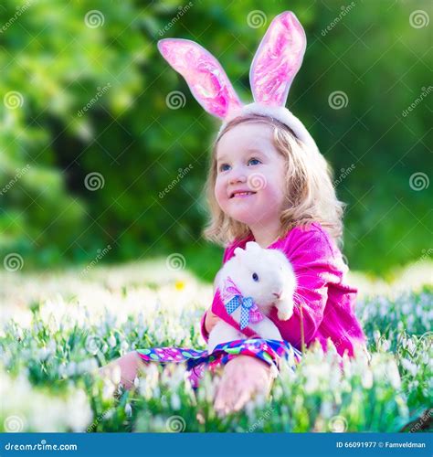 Little Girl Playing With A Rabbit Stock Image Image Of Grass Ears